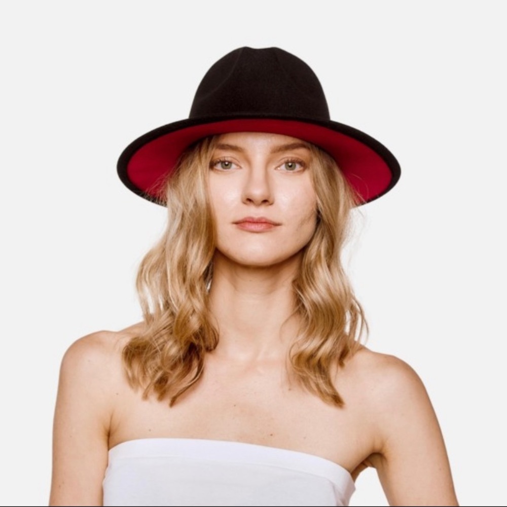 Two tone felt wide brim hat with faux embossed leather band.